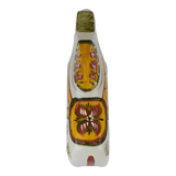 Hand-painted Dala horse wooden shoe viewed from above, decorated with yellow, orange, red, green, and white floral and geometric patterns.
