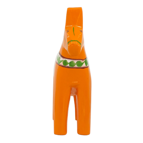 Bright orange Swedish Dala horse carved from wood, featuring minimal paint and a green band around the neck, standing on four legs against a white background.