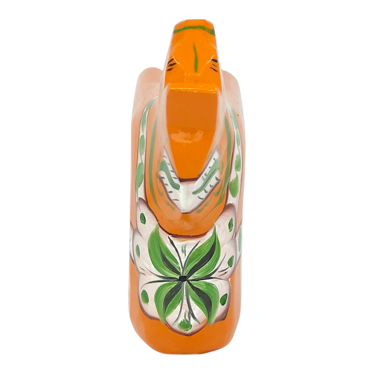 Orange Swedish Dala horse with green and white floral patterns on its body, made of pine wood, shown from above on a white background.