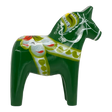 Green Swedish Dala horse carved from wood, featuring yellow, white, and red painted patterns, shown on a white background.