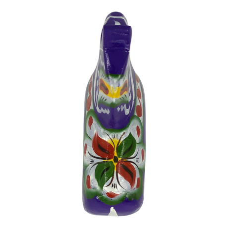 Purple Swedish Dala horse carved from wood, shown against a purple background with red, green, yellow, and white floral patterns painted on the front.