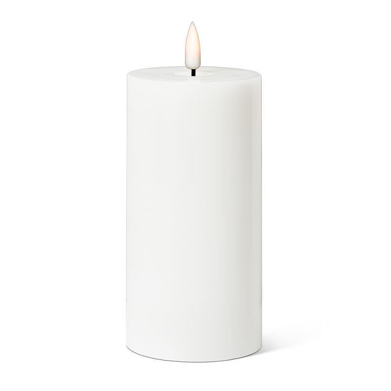 Experience the sophistication of the 6" LED Pillar Candle in white. This tall, cylindrical candle features a lifelike 3D LED flame at its peak and offers an impressive run time of over 150 hours, making it a perfect addition to your home decor.