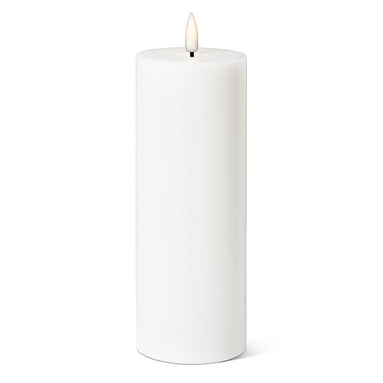 The 8" LED Pillar Candle in white features a 3D LED flame that provides the allure of a real candle, with over 150 hours of runtime.