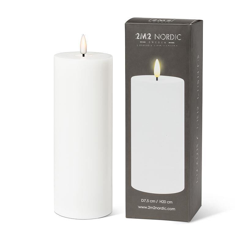 A white 8" LED pillar candle is placed next to its elegant black packaging box, featuring a candle image and product details, boasting an impressive run time of over 150 hours.