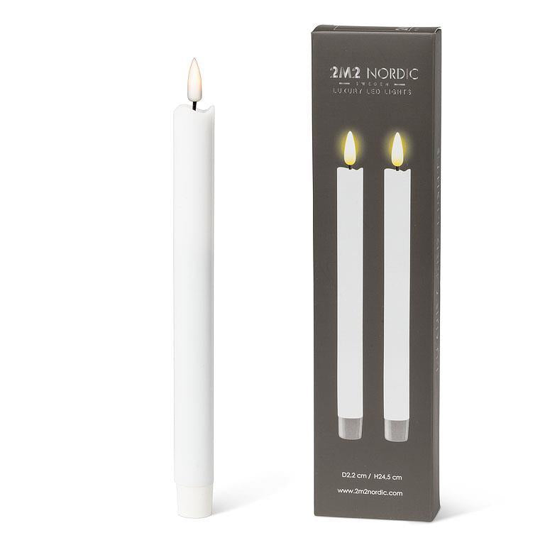 Tall white 9.5" LED taper candle next to its box, showcasing two candles with lit flames, features a realistic 3D LED flame for an authentic glow.