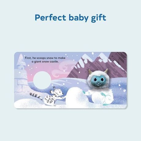A baby yeti finger puppet in a winter scene with a snow castle and text that reads, First, he scoops snow to make a giant snow castle.