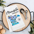 The Tea Towel: Minnesota the North Star State Map Souvenir Kitchen Cotton Flour Sack Towel features a colorful illustrated map and makes a charming 100% cotton kitchen accessory or unique Minnesota souvenir.