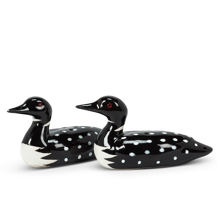 Two ceramic figurines with red eyes and polka dots, reminiscent of loons, face right. Product: Shaker - Salt & Pepper Shaker - Loons.