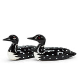 Two ceramic figurines with red eyes and polka dots, reminiscent of loons, face right. Product: Shaker - Salt & Pepper Shaker - Loons.
