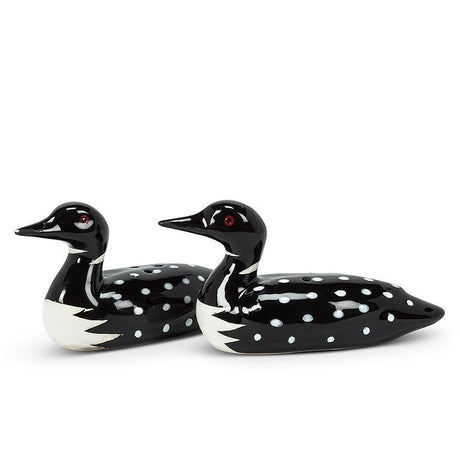 Two ceramic figurines with red eyes and polka dots, reminiscent of loons, face right. Product: Shaker - Salt & Pepper Shaker - Loons.
