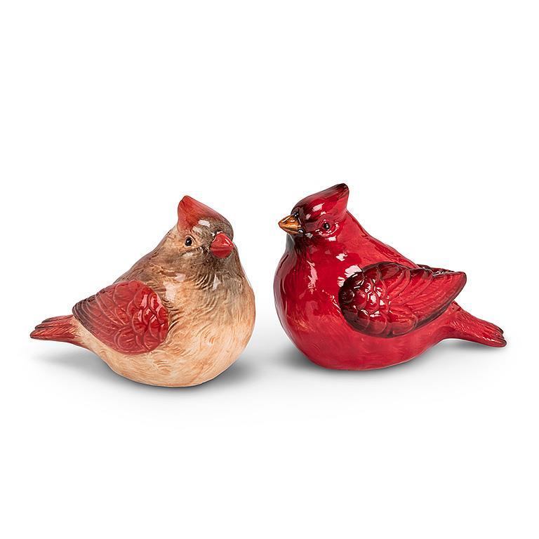 Two vibrant ceramic bird figurines, a red and a brown one, styled as Shaker: Salt & Pepper Shaker - Cardinals, facing each other against a white background.