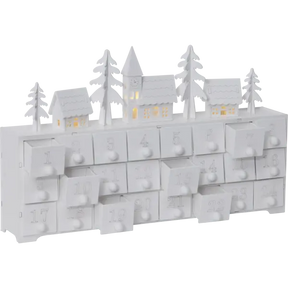 The Candelabra: Star Trading Yuletide Advent Calendar is a white calendar with numbered drawers and LED lights, showcasing a delightful decorative scene of houses and trees on top.