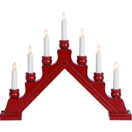 The Candelabra: Star Trading Karin Electric 7-Light in red, brown, or gray features seven white electric candles arranged in a triangular arch, inspired by Swedish Christmas traditions.