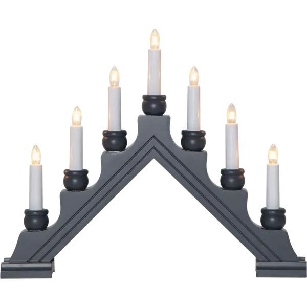 The Candelabra: Karin Gray 7 Light is a black, triangular indoor candelabra with seven white candles in tiers, capturing the elegance of a Swedish Christmas decoration.