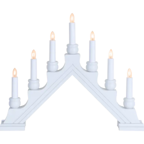The Candelabra: Star Trading - Karin Electric 7-Light, crafted in Sweden, features a white triangular design with seven lights ascending symmetrically to meet elegantly at the top.