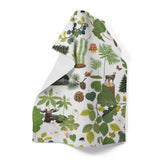 The "Skogsliv" Forest Life Tray by Arvidssons Textil of Sweden (8.5x13 in) features forest plants, pinecones, leaves, mushrooms, berries, and animals like a moose and wolf on a white background.