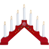 The Star Trading Adam 7 Bright Red Floral Candelabra features seven white electric candles and painted pink flower with green leaves—an ideal Swedish Christmas decoration for windows or tables.