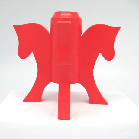 The Swedish Red Dala Horse Candle Holder features four stylized horse heads inspired by the iconic Dala Horse, connected by a cylindrical center and four legs—a striking piece for Scandinavian decor.