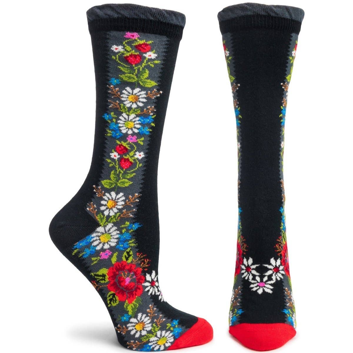 The Ozone Women's Folklore Sock in black, featuring colorful floral patterns with red toes and heels, draws inspiration from Scandinavian Folk Art to add a whimsical charm. These stylish socks perfectly embody the essence of the collection.