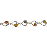 The Bracelet: Multi-Color Baltic Amber Sterling Silver Heart Bracelet 8" Long features open heart links accented with round multi-color Baltic amber stones.