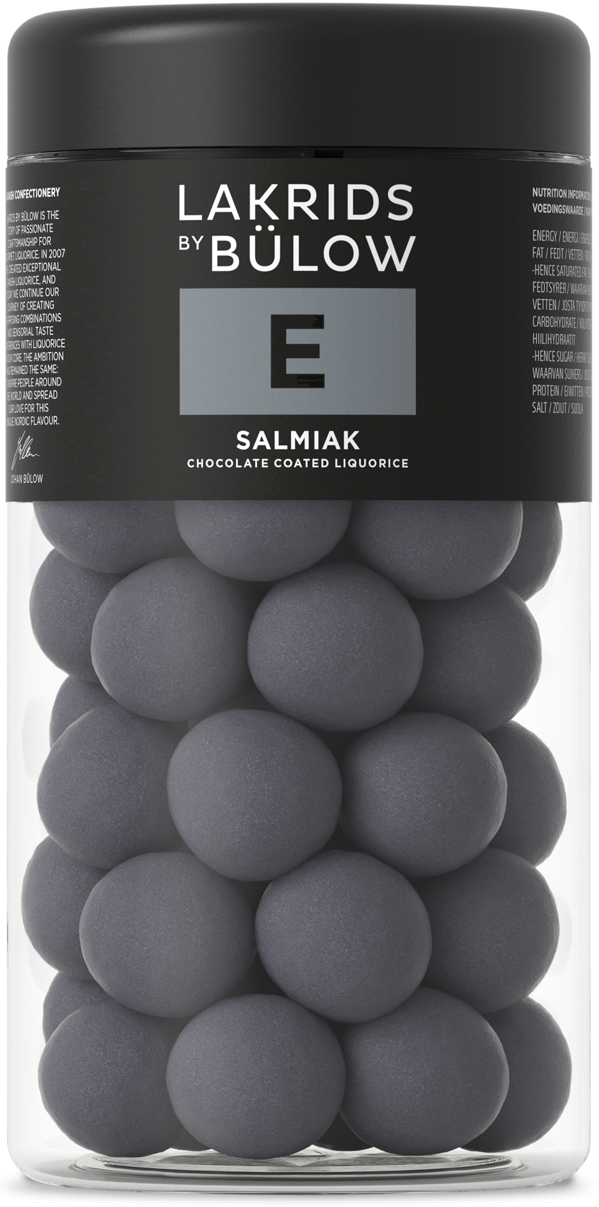 A clear jar with a black lid and gray front label contains round, dark gray chocolate-coated licorice candies. The Nordic brand name is visible on the label.