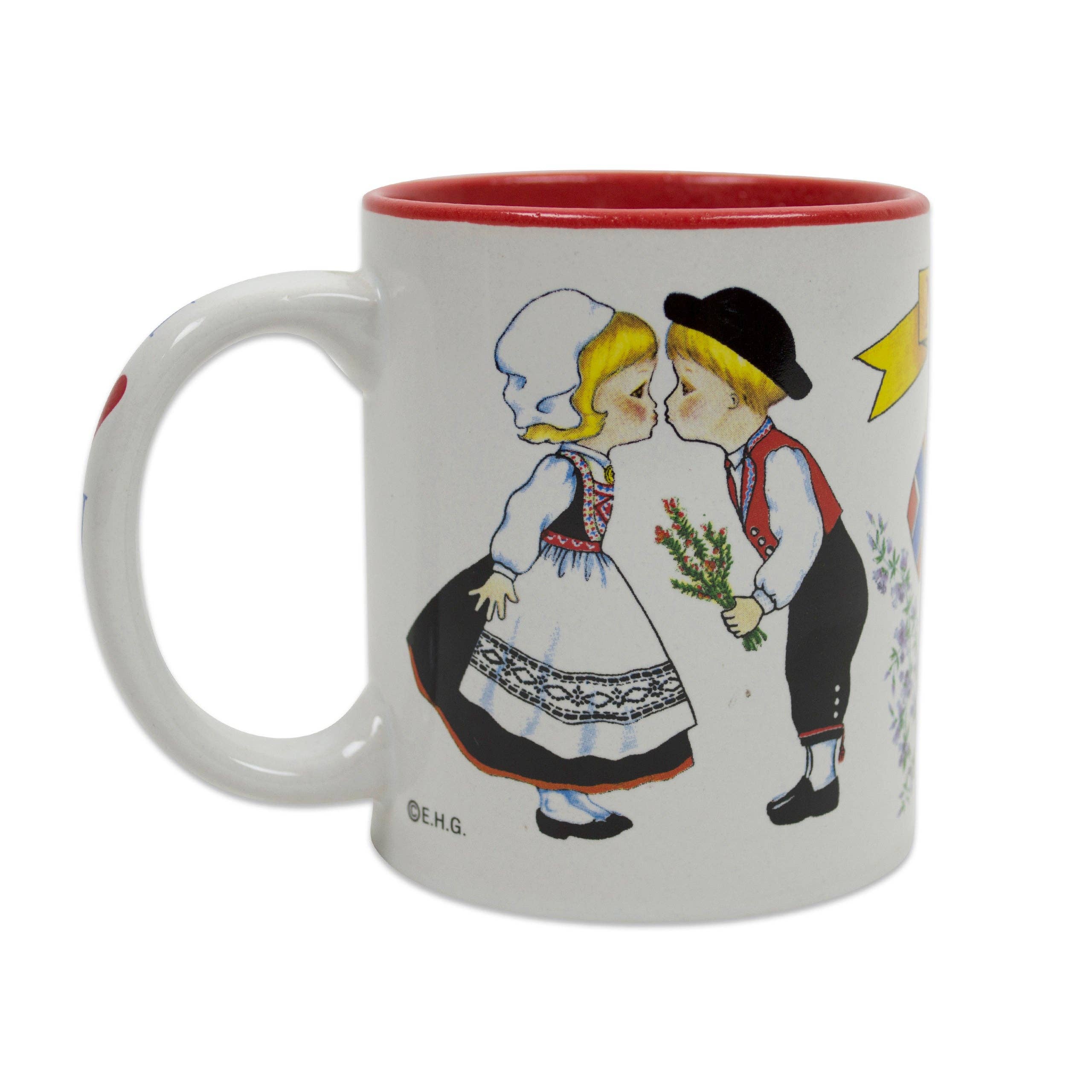 Ceramic mug with Norwegian graphics of a boy and girl in traditional attire about to kiss, red interior, perfect for expressing I Love Norway with every sip.