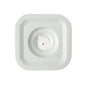 A square, white Stumpastaken Ettan candle holder (8.8x8.8x4 cm) in 100% recycled material, viewed from above, with clean lines and sustainable Scandinavian design echoing the simplicity of a central sensor pad.