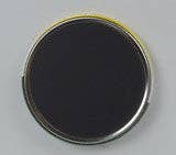 A round, black disc resembling the "Magnet: Living with a Swede Builds Character! Refrigerator Magnet" is shown against a plain background, reminiscent of a minimalist refrigerator magnet.