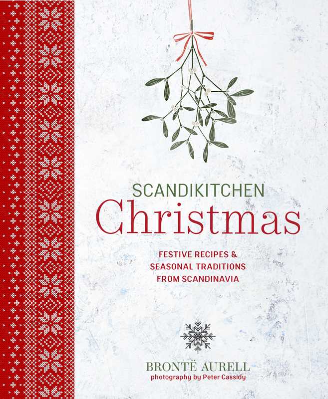 Cookbook cover with red Scandinavian-inspired patterns, mistletoe illustrations, and white text about Christmas recipes and traditions by Brontë Aurell.