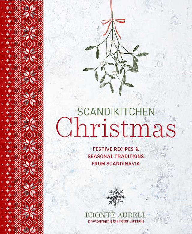 Cookbook cover with red Scandinavian-inspired patterns, mistletoe illustrations, and white text about Christmas recipes and traditions by Brontë Aurell.