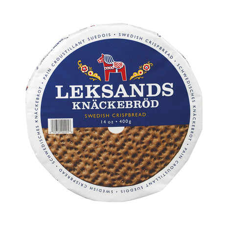 Round package of Leksands Original Crispbread, crafted with hearty rye flour and displaying a red and blue horse logo on the front. The package weighs 14 oz (400g).
