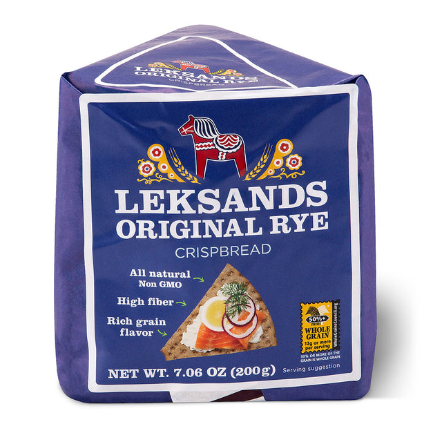 A 200g package of Leksands Original Crispbread Triangles, featuring rye flavor and high fiber content, with product details and a serving suggestion image on the front.