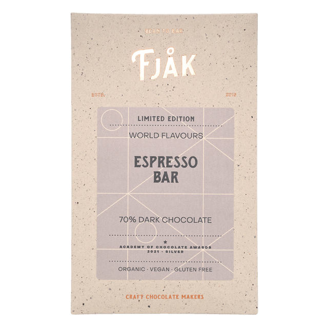 Front of a Fjåk wrapper labeled "Fjak Espresso Dark Chocolate 70% Cocoa (Limited Edition) Norwegian Chocolate 60g"—organic, vegan, gluten-free, and winner of the Academy of Chocolate 2021 Silver award.