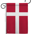 The Flag: Denmark Garden Flag - Danish Nationality Home Decor Flag features a red flag with a white Scandinavian cross, resembling Denmarks national flag, displayed on a black metal holder and made from weather-resistant fabric.