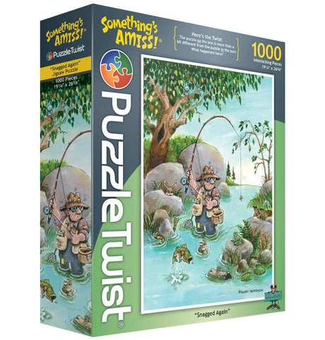 PuzzleTwist 1000-piece jigsaw puzzle box showing a cartoon fisherman in a river with fish; cover art by Gary Patterson with the title “Snagged Again.”.