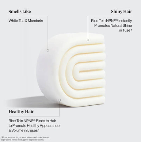 The Hair: Rice Water Shampoo & Conditioner Bar Combo for Hair Growth by Kitsch features curved white bars with a white tea and mandarin scent, using Rice Tein NPNF to promote shine and support healthy hair growth.