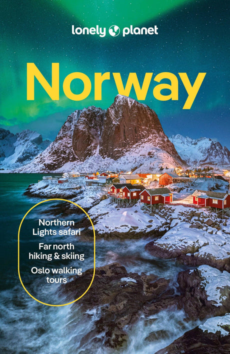 Cover of the Hachette Book Group’s “Lonely Planet Norway Northern Lights Safari Far North Hiking & Skiing Oslo Walking Tours Travel Guide” paperback, featuring snow-dusted mountains, vibrant houses, and the Northern Lights illuminating the sky. Text highlights unforgettable experiences such as Tromsø Northern Lights safaris, adventures in the Lofoten Islands, hiking and skiing excursions in the far north, and walking tours in Oslo.