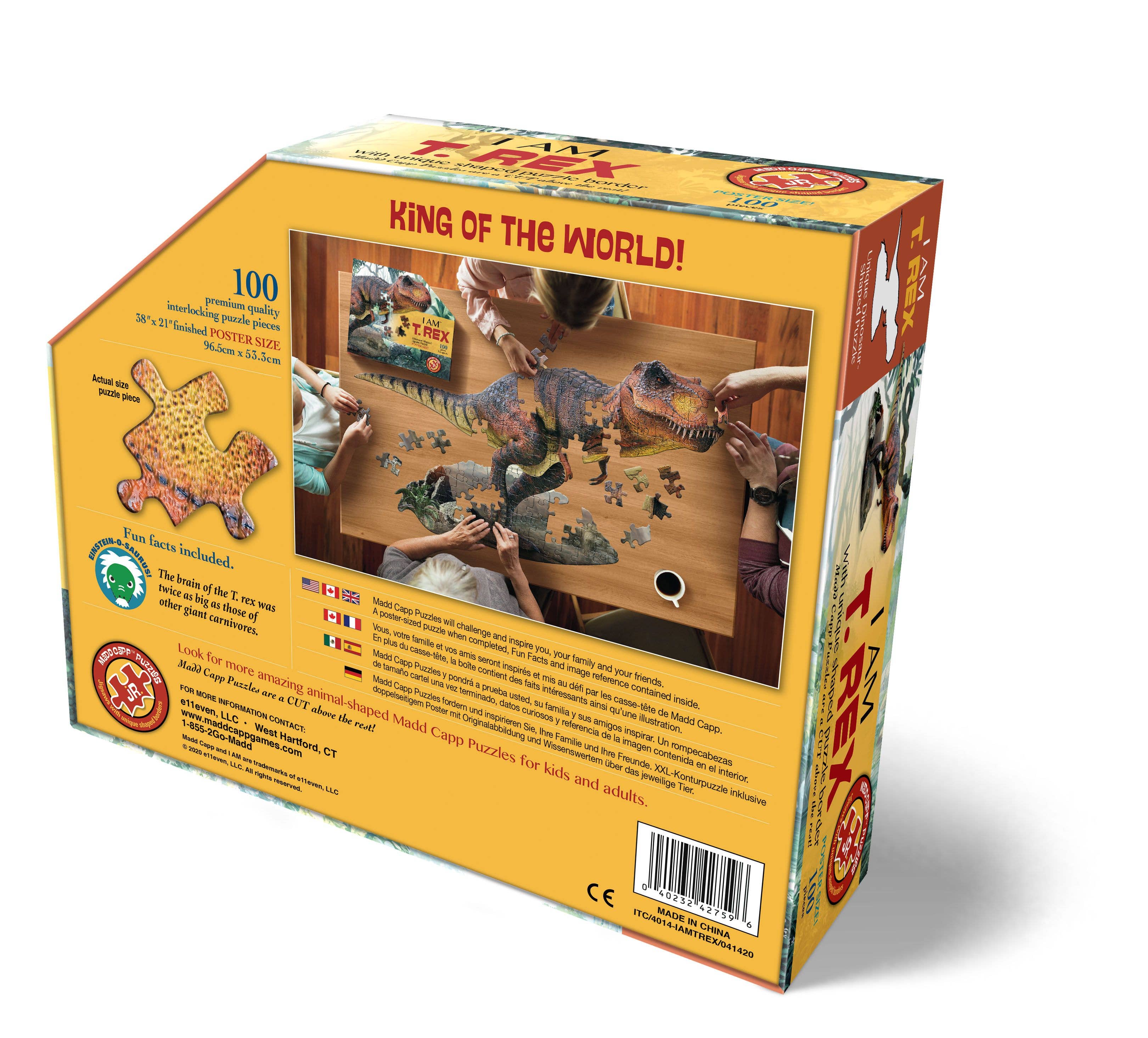 The box highlights a 100-piece puzzle called I AM T. Rex which includes a vibrant, animal-shaped jigsaw adorned with sustainability symbols and educational Fun Facts available in multiple languages.