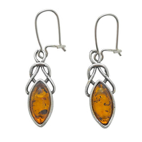 A pair of Celtic dangle earrings crafted from sterling silver, featuring genuine cognac Baltic amber stones in an intricate marquise-shaped design.