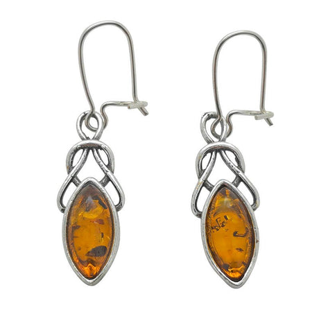 A pair of Celtic dangle earrings crafted from sterling silver, featuring genuine cognac Baltic amber stones in an intricate marquise-shaped design.