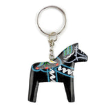 Black Dala horse keychain with colorful painted patterns on wood, attached to a silver key ring by a short chain.