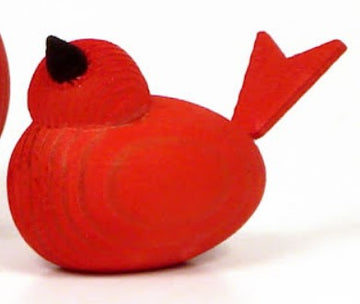 The "Figurine: Wooden Scandi Birds" is a red, handmade abstract bird sculpture from Sweden with a black beak and simplified features.