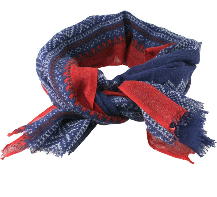 The Marius Navy Red and White Norwegian Design Womens Scarf is made from 100% wool and features a classic geometric pattern with frayed ends.