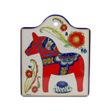 The European Heritage Gifts Tile: Red Dala Horse Cheeseboard is a 7.5" ceramic tile with cork backing and a hanging hole, perfect for wall decor or as a unique trivet featuring traditional Swedish design.