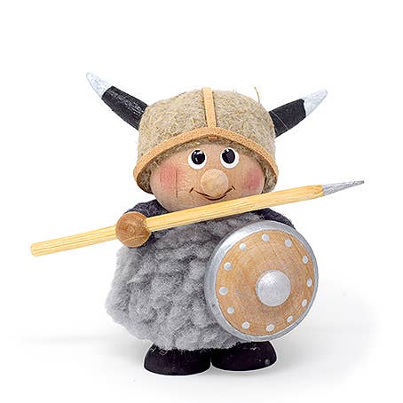 The "Figurine: Viking man with Spear and Shield" is a handcrafted piece depicting a Scandinavian Viking gnome adorned with a horned helmet and gray fur cloak, holding a spear and round shield to embody the spirit of ancient warriors.