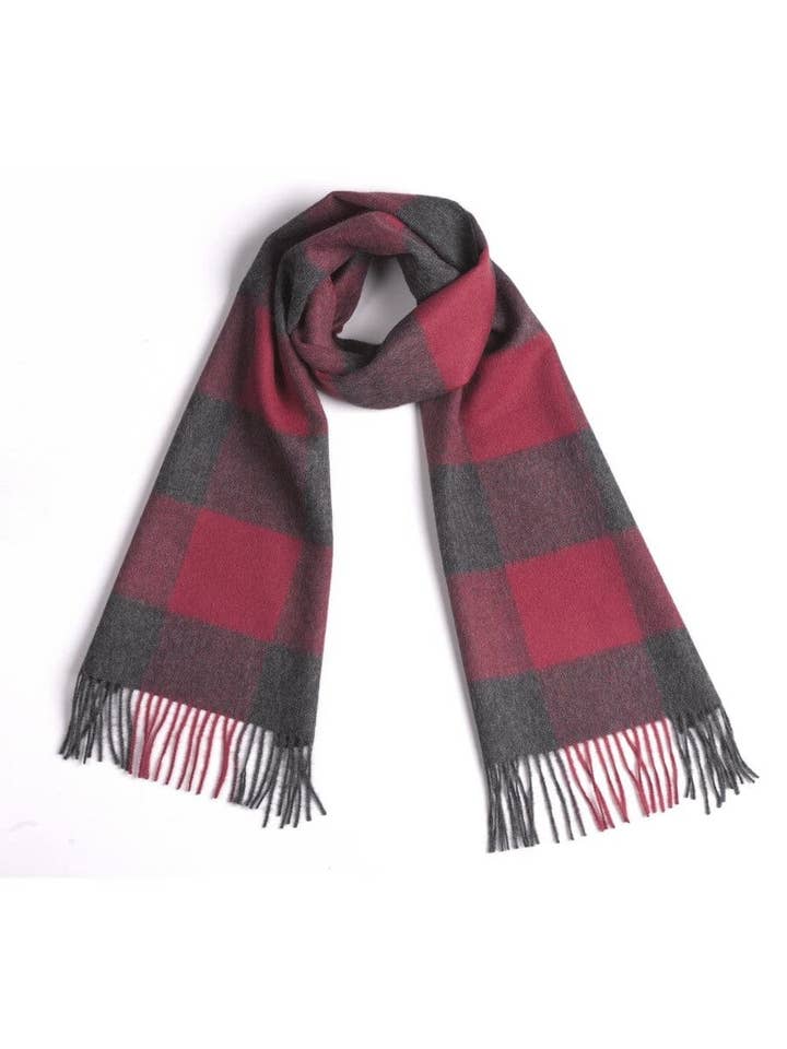 The Scarf: 100% Baby Alpaca Luxury Square Red, showcasing its luxurious red plaid pattern, is elegantly crafted from soft alpaca wool with fringed ends on a white background.