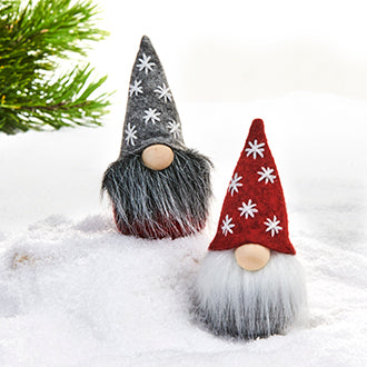 Two 3.5" Tomte Santa gnome figurines, each sold separately in red or gray, feature large noses, long beards, and tall hats—perfect holiday table decor inspired by Swedish tradition.