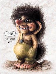 The NyForm Troll Ole figurine stands barefoot in yellow pants with big ears, a wide grin, and spiky black hair. This charming piece of Norwegian design measures 6.25 inches tall and reads 118.