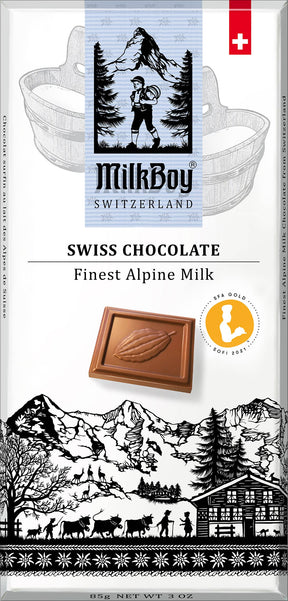 Front of a MilkBoy Swiss Chocolate 3 oz Alpine Milk Chocolate bar wrapper featuring Swiss alpine imagery, a chocolate square, and the text: Swiss Chocolate Finest Alpine Milk.