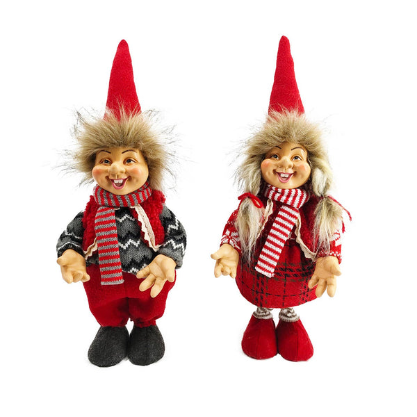 Truly the Troll Boy or Girl, 12" tall, features a red hat, striped scarf, fur-trimmed hood, and smiling face. This Scandinavian figurine in festive red and black adds playful charm to your Nordic Christmas decor.